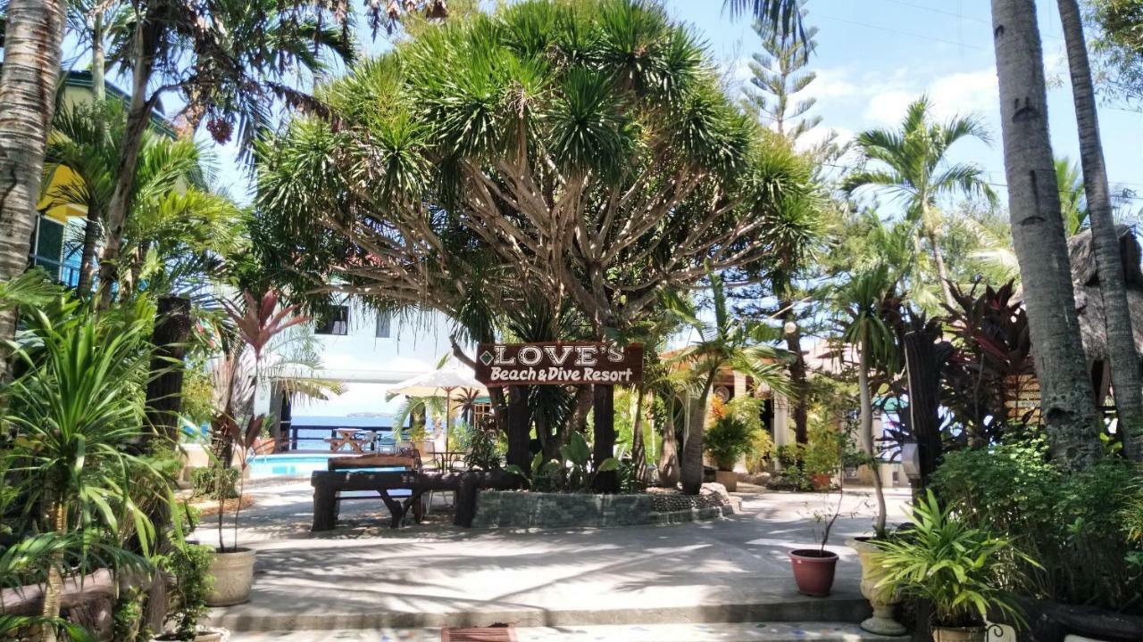 Love'S Beach & Dive Resort Моалбоал Экстерьер фото
