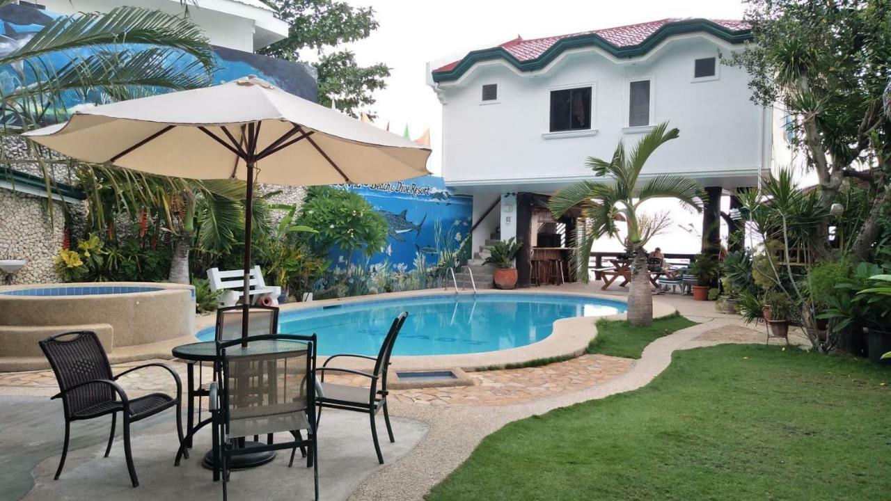 Love'S Beach & Dive Resort Моалбоал Экстерьер фото